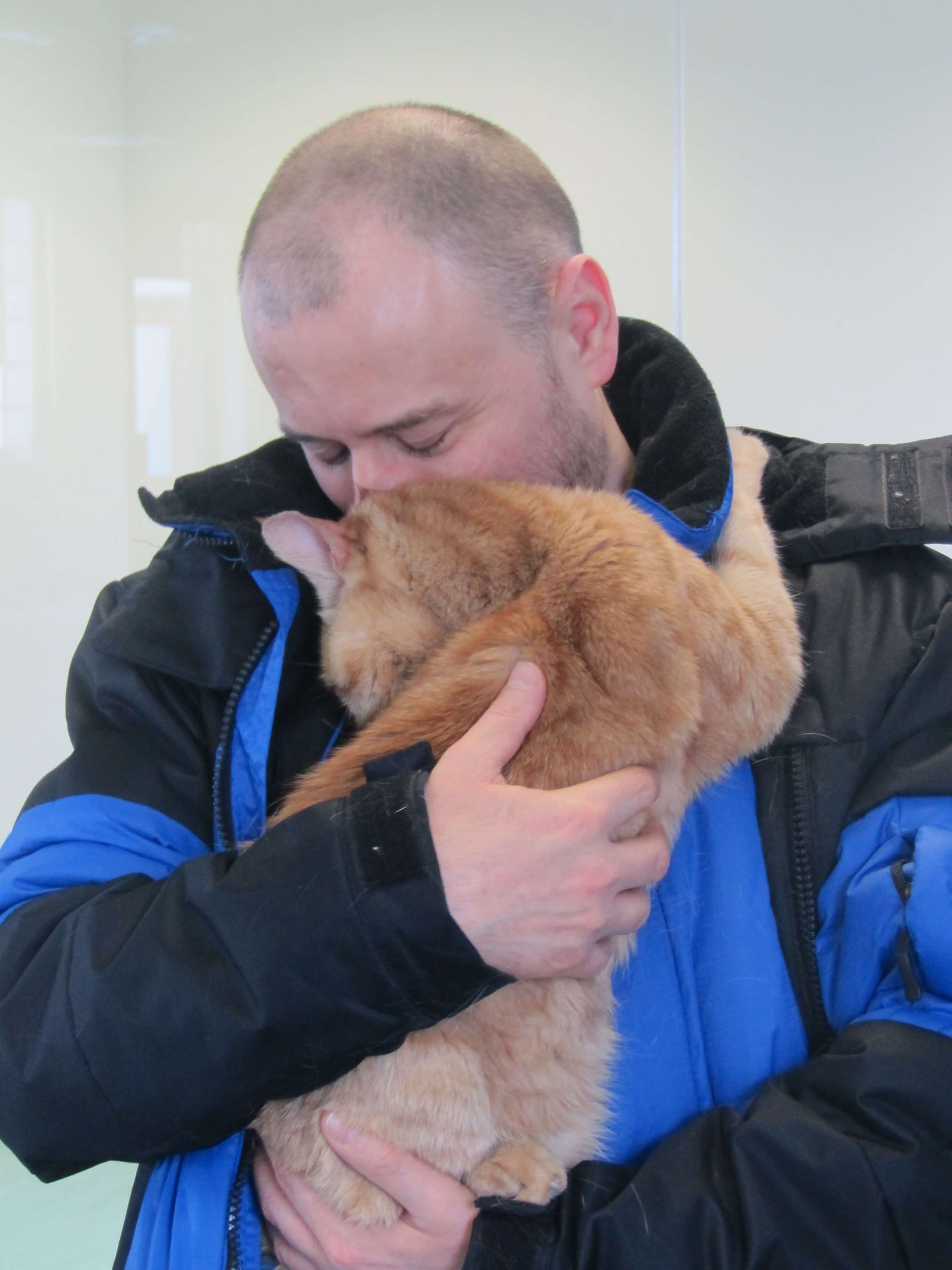 cured hyperthyroid cat & owner